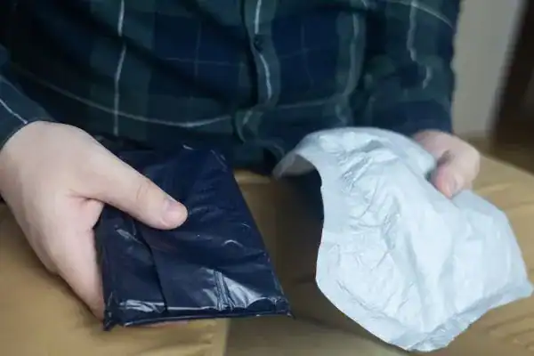 image of man holding stool incontinence Lancaster products